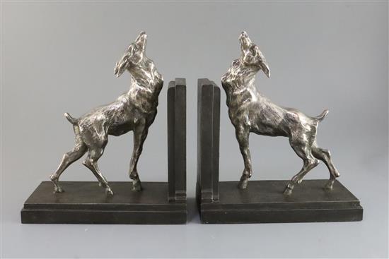 E. Carlier. A pair of silvered and bronzed metal bookends modelled as fawns, 8.25in.